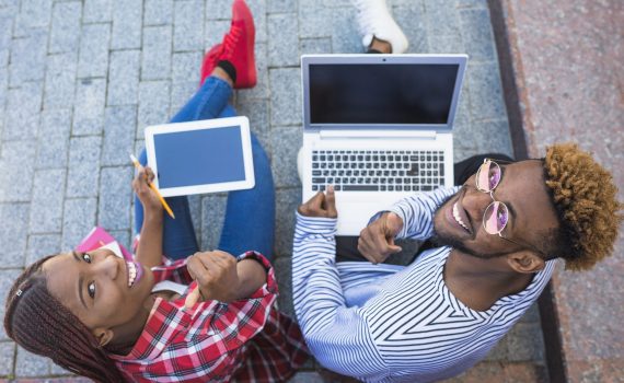 black-students-posing-with-gadgets